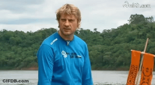 Man In Red Sweatshirt Saying Rock Looking Down GIF
