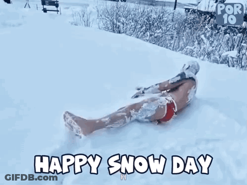 Man In Red Swimsuit Lying In Snow GIF