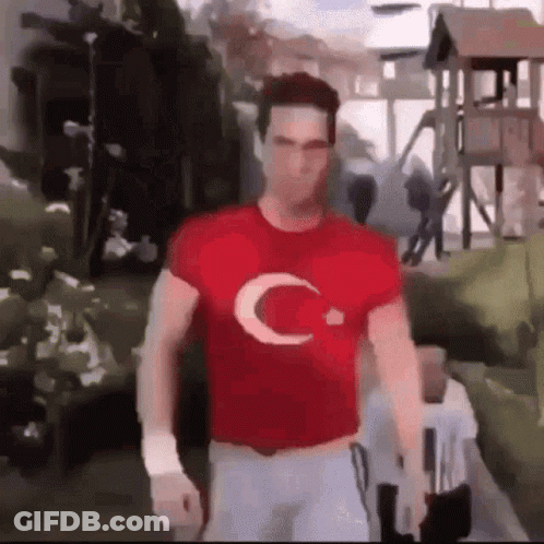 Man In Red T-Shirt With C Walking GIF