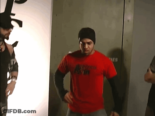 Man In Red T-Shirt With Gorilla Print GIF