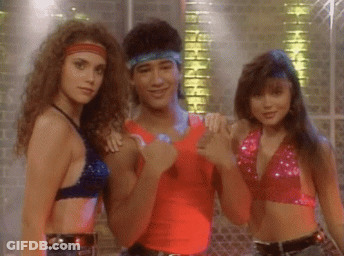 Man In Red Tank Top Between Two Women GIF