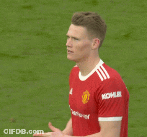Man In Red TeamViewer Jersey On Soccer Field GIF