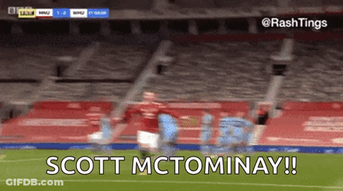 Man In Red Teamviewer Jersey On Soccer Field GIF