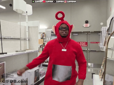 Man In Red Teletubbies Costume In Store GIF