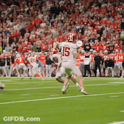 Man In Red Thrasher Shirt In Front Of Crowd GIF