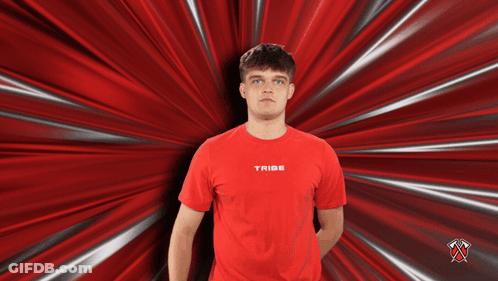 Man In Red Tribe T-Shirt On Red Background GIF