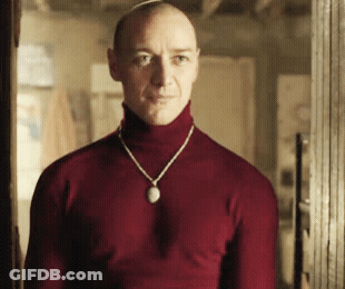 Man In Red Turtleneck And Necklace GIF