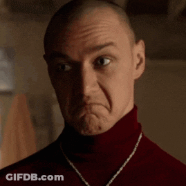 Man In Red Turtleneck Making Face GIF