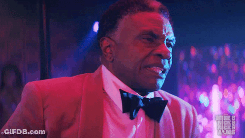 Man In Red Tuxedo Asking Who GIF