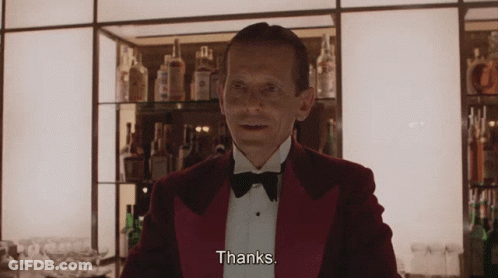 Man In Red Tuxedo Says Thanks GIF