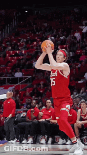 Man In Red Tuxedo Talking To Another Man GIF