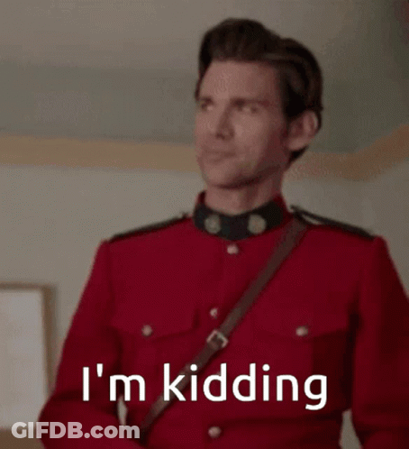 Man In Red Uniform Saying I'm Kidding GIF