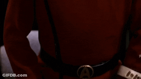 Man In Red Uniform With Medal GIF