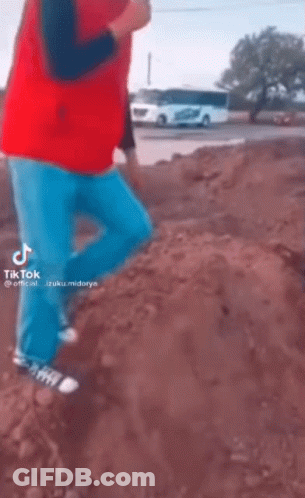Man In Red Vest Jumping With Hammer GIF