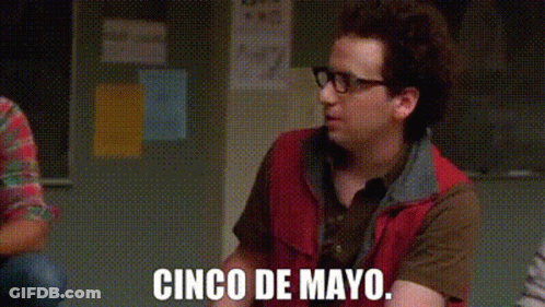 Man In Red Vest Talking Cinco De Mayo GIF