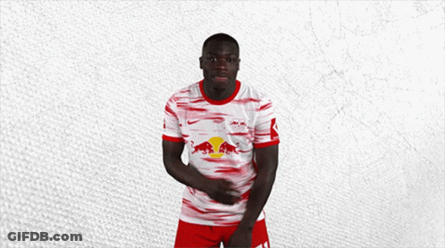 Man In Red White And Blue Shirt With Red Bull GIF