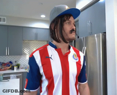 Man In Red White And Blue Striped Shirt With Puma Logo GIF