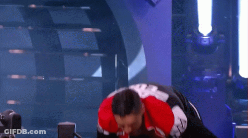 Man In Red White Black Jacket And Shorts GIF