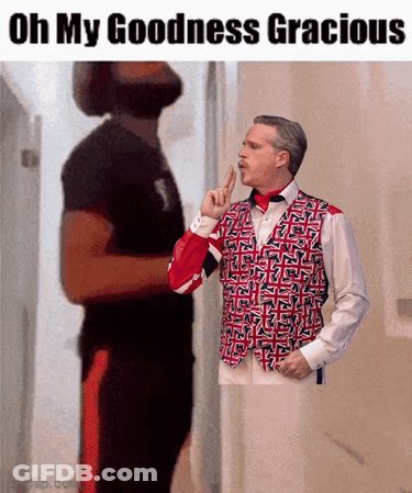 Man In Red White Blue Vest Shushing GIF