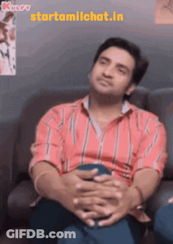 Man In Red White Striped Shirt On Couch GIF