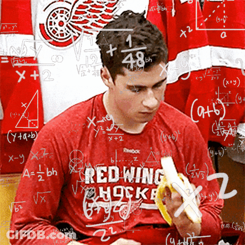 Man In Red Wing Hockey Shirt Eating Banana GIF