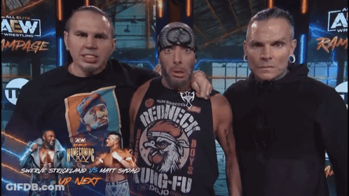 Man In Redneck Shirt With Two Men GIF
