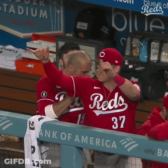 Man In Reds Jersey Giving Thumbs Up GIF