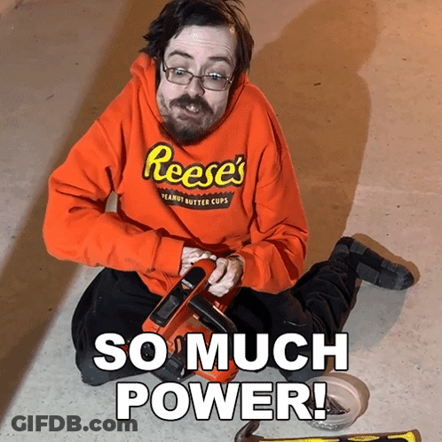 Man In Reese's Sweatshirt Kneeling GIF