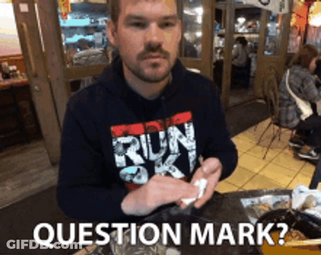 Man In Restaurant Saying Question Mark GIF
