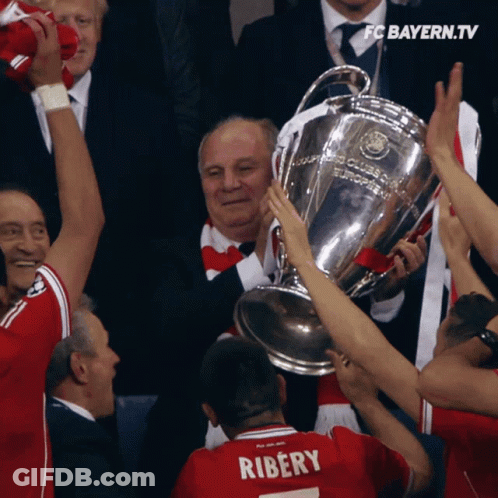 Man In Ribery Jersey Holding Trophy GIF