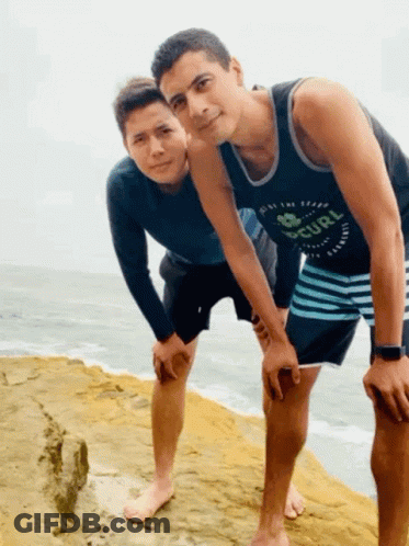 Man In Rip Curl Shirt Next To Another Man GIF