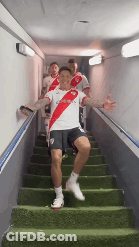 Man In River Plate Jersey Walking Up Stairs GIF