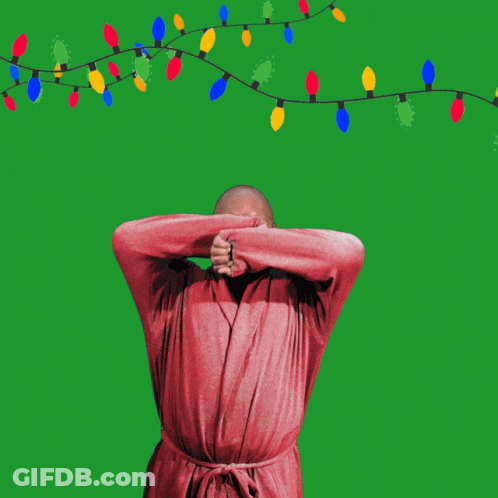 Man In Robe Flexing With Christmas Lights Yawn GIF