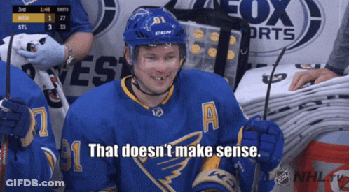 Man In Robe In Front Of Number 6 And 9 GIF