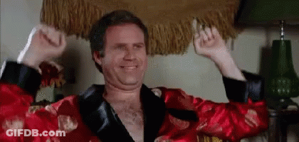 Man In Robe Raising Arms GIF