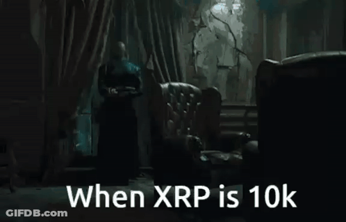 Man In Robe Standing By Window When XRP Is 10K GIF