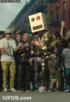 Man In Robot Costume Dancing With Cardboard Box GIF
