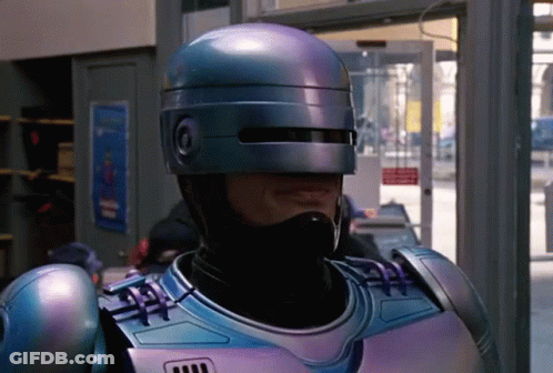 Man In Robot Costume With Helmet And Mask GIF