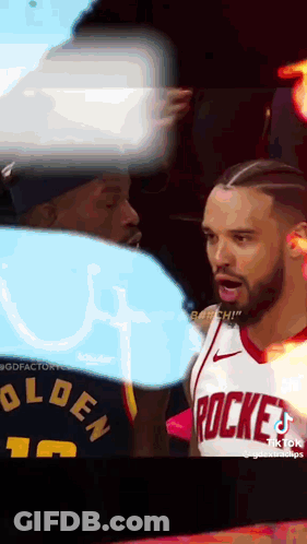 Man In Rockets Jersey Next To Man In Black Hat GIF