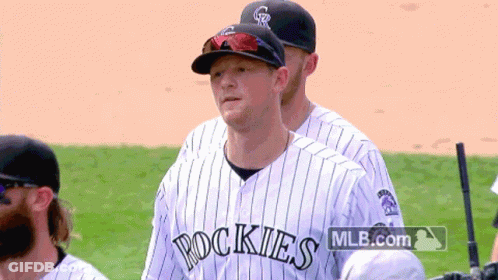 Man In Rockies Jersey On Field GIF