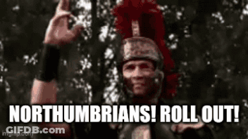 Man In Roman Helmet Making Devil Horns Sign GIF