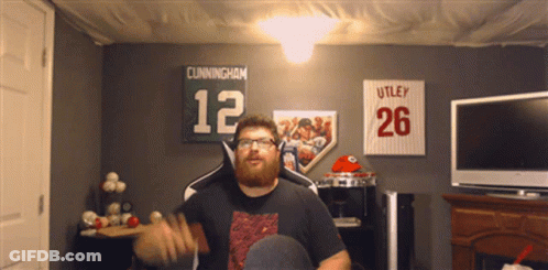Man In Room With Cunningham Sign GIF