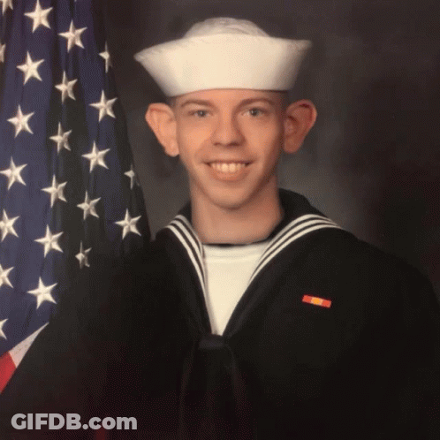 Man In Sailor Uniform Smiling GIF