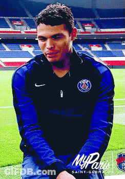Man In Saint-Germain Shirt Sitting On Grass GIF