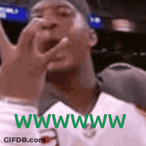 Man In Saints Jersey Holding Tablet GIF