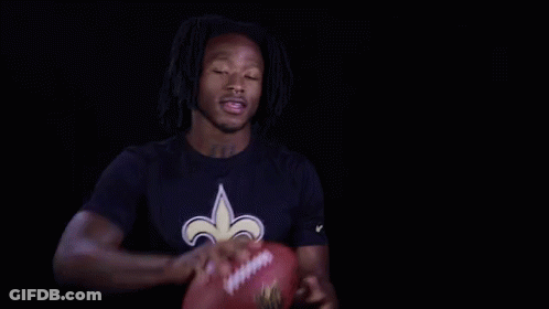 Man In Saints Shirt Holding Football GIF