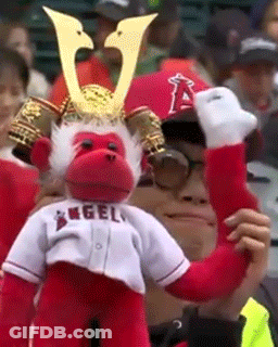 Man In Samurai Hat With Stuffed Monkey Saying Angels GIF