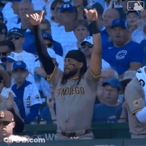 Man In San Diego Jersey Arms Up GIF