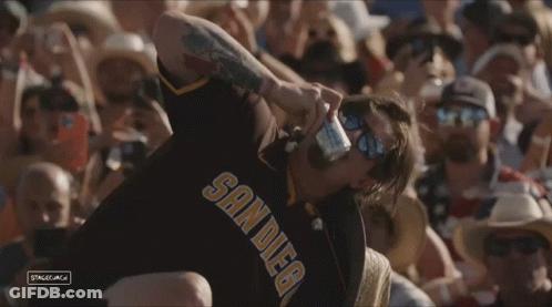 Man In San Diego Jersey Drinking Beer GIF