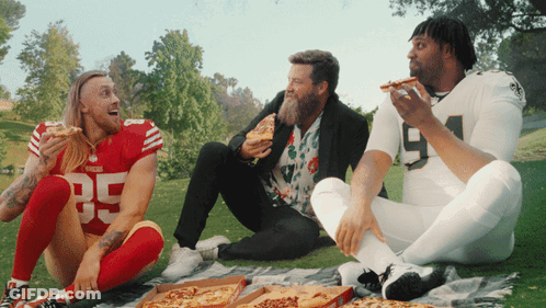 Man In San Francisco 49Ers Jersey Eating Pizza On Blanket GIF